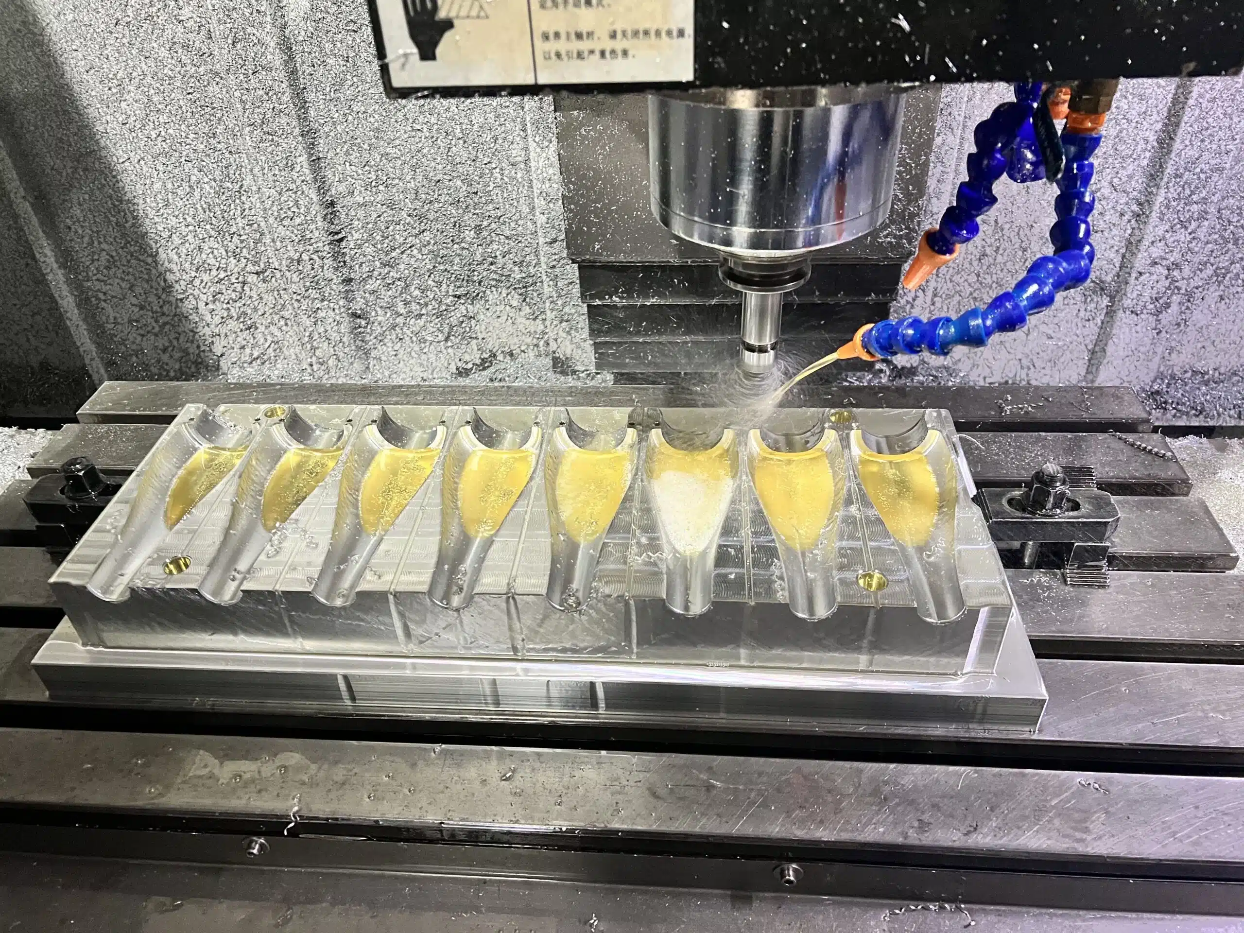 A High-Quality Pet Bottle Mold Gleaming Under Factory Lights