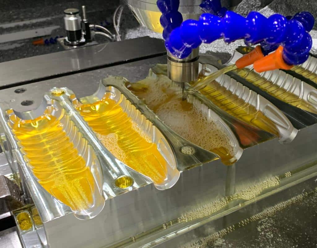 High-Precision Cnc Machine Working On A Mold