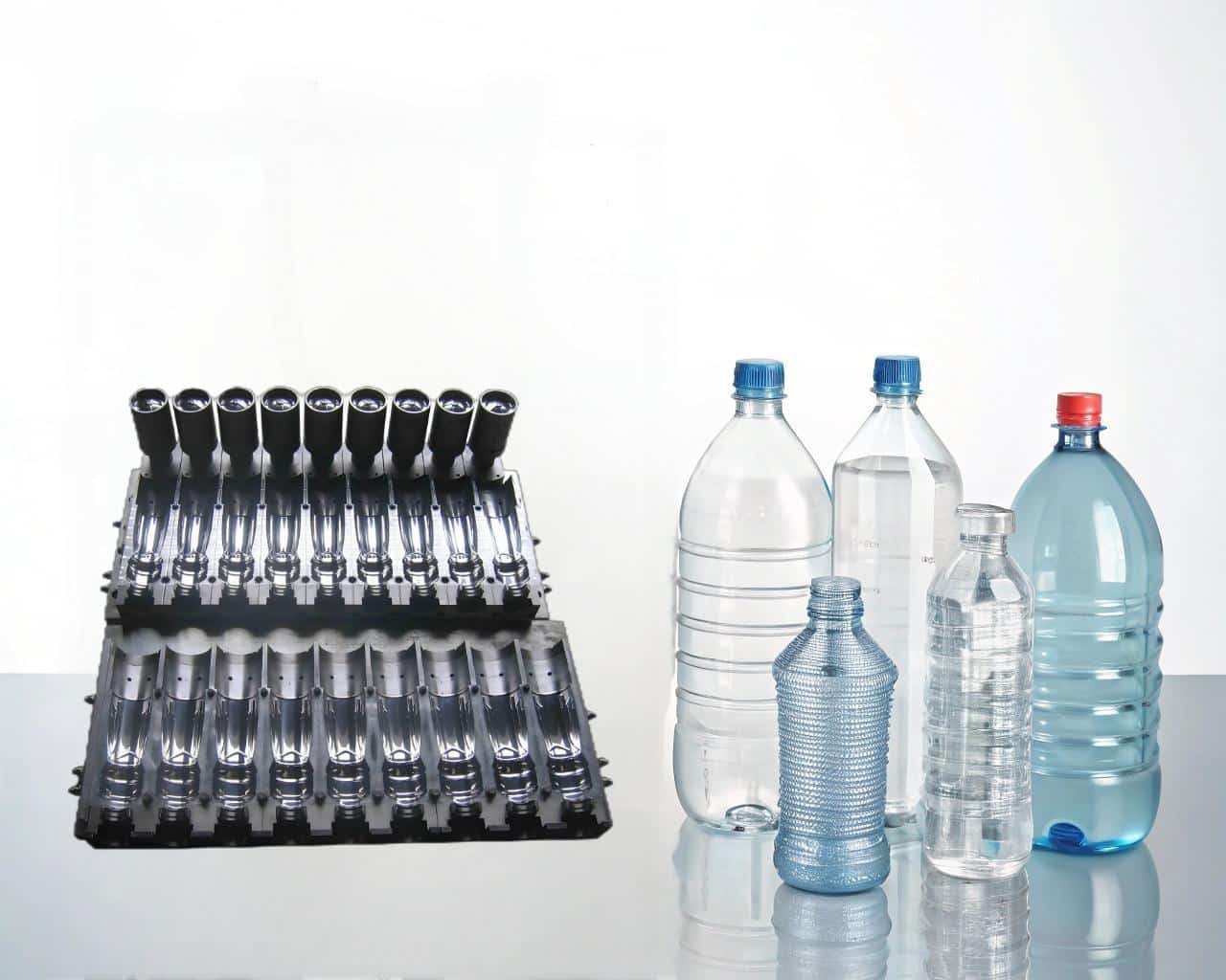 A Collection Of Advanced Pet Blowing Moulds And A Variety Of Pet Bottles