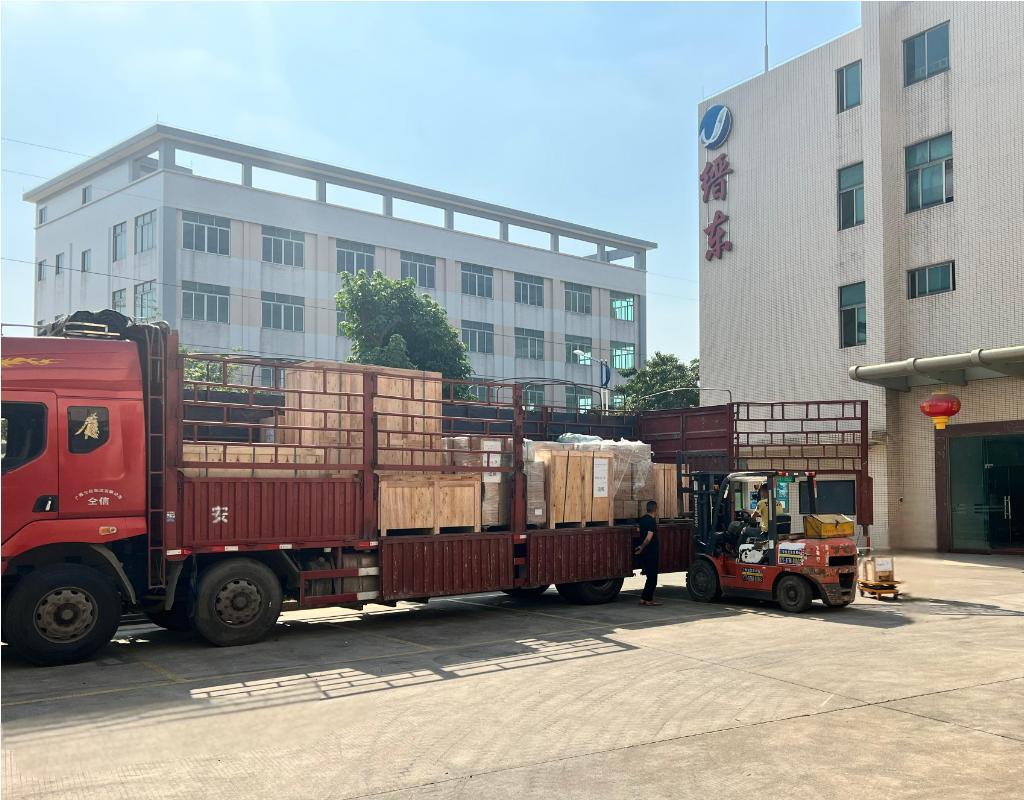 A Logistics Team Loading A Finished Mold For On-Time Shipment