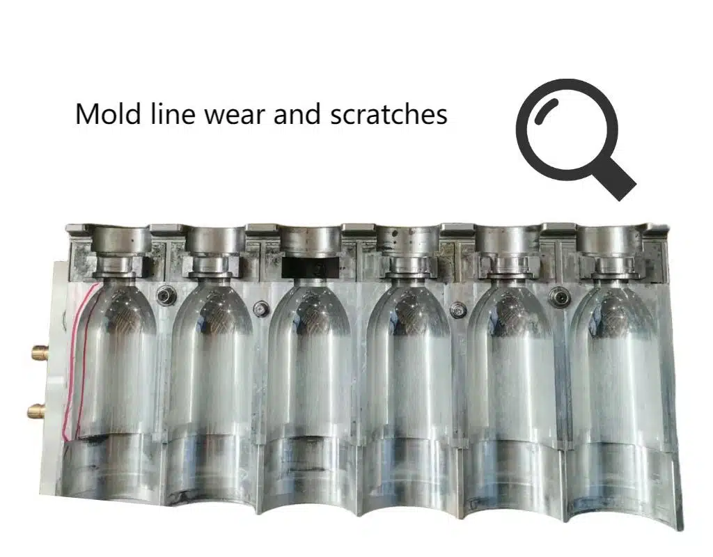 A Magnifying Glass Hovering Over A Blow Mold'S Parting Line