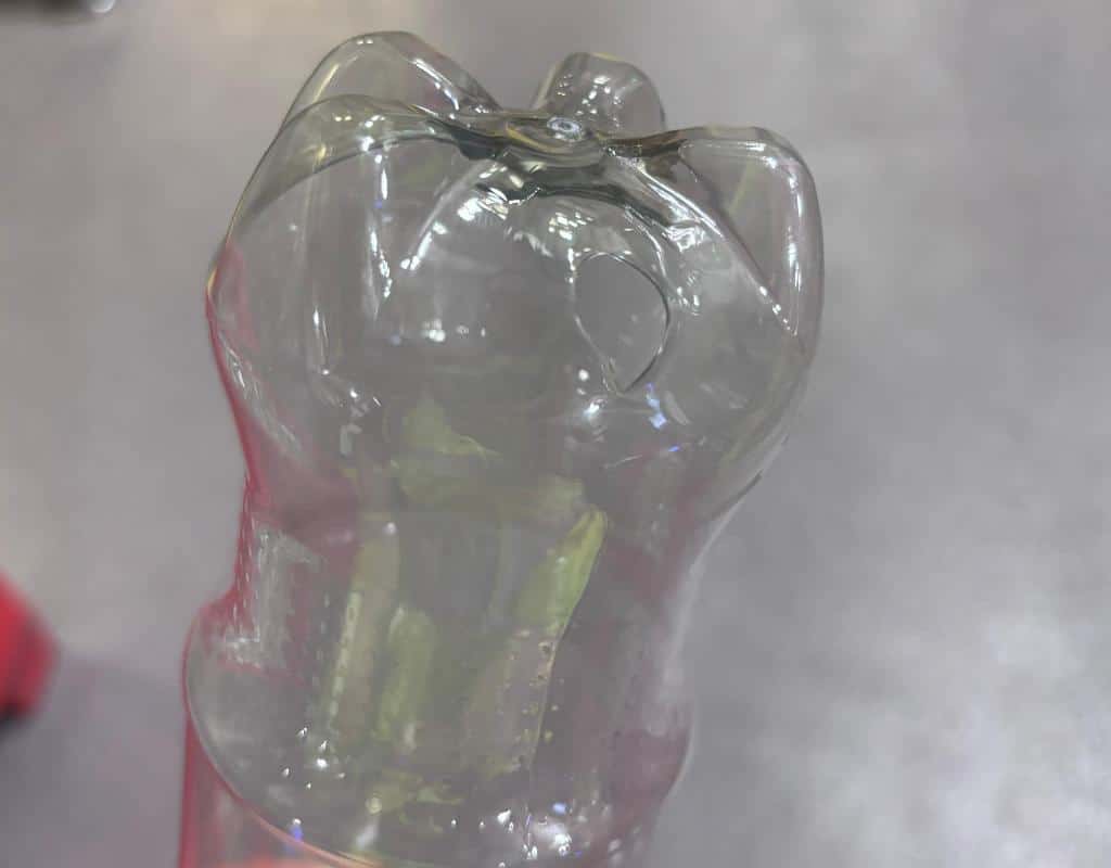 An Animation Showing A Small Preform Trying To Blow Into A Very Large Bottle Mold And Bursting
